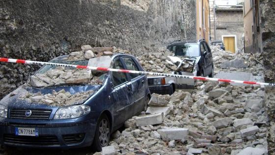 Cars are buried under the rubble post-earthquake in an undisclosed Italian town