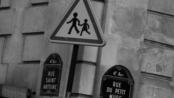 A traffic sign depicting people crossing the road in France