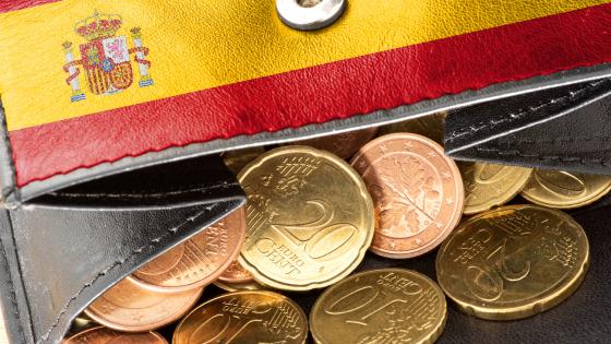 Wallet decorated with Spanish flag containing euro coins