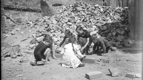 Children playing in rubble