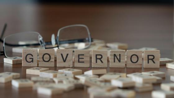 Governor spelled out with letter tiles