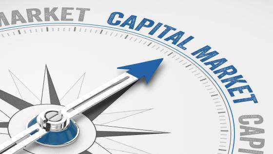 Compass pointing to capital market