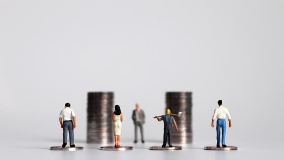 Miniature figures depicting workers on minimum wage