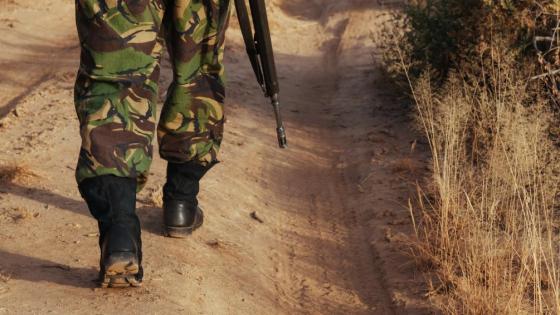 A soldier walks along a road in an undisclosed location in Africa