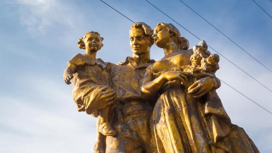 A soviet era statue of a nuclear family