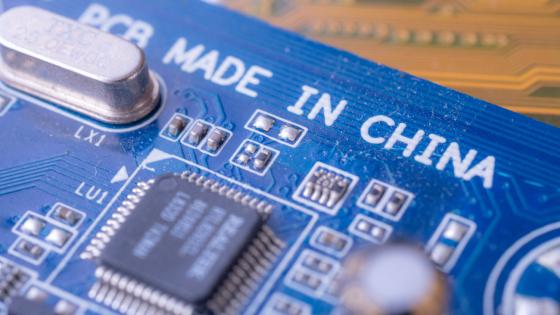 Made in china tag text on blue computer main board circuit