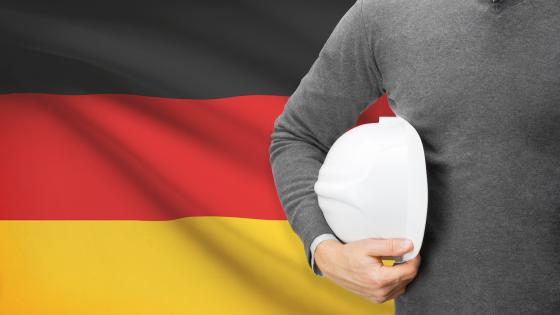 Worker in front of Germany flag