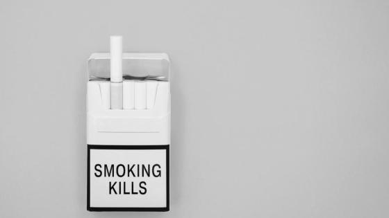 A pack of cigarettes with the label 'Smoking Kills'