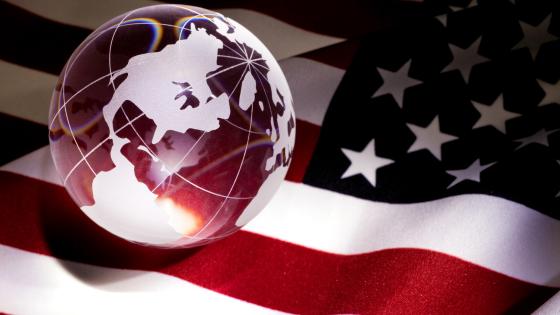 Glass globe and US flag