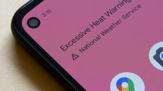Notification of excessive heating warning issued by National Weather Service is seen on the screen of a smartphone