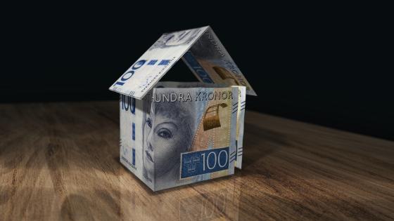 Origami house made with Swedish krona notes