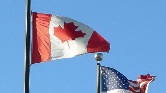 617px-Flags-of-usa-and-canada.jpg