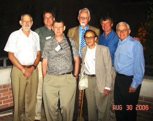 Photo of Joe Ostroy, Gary Hansen, Roger Farmer, Axel Leijonhufvud, Ken Sokoloff, John Riley and Mike Intriligator